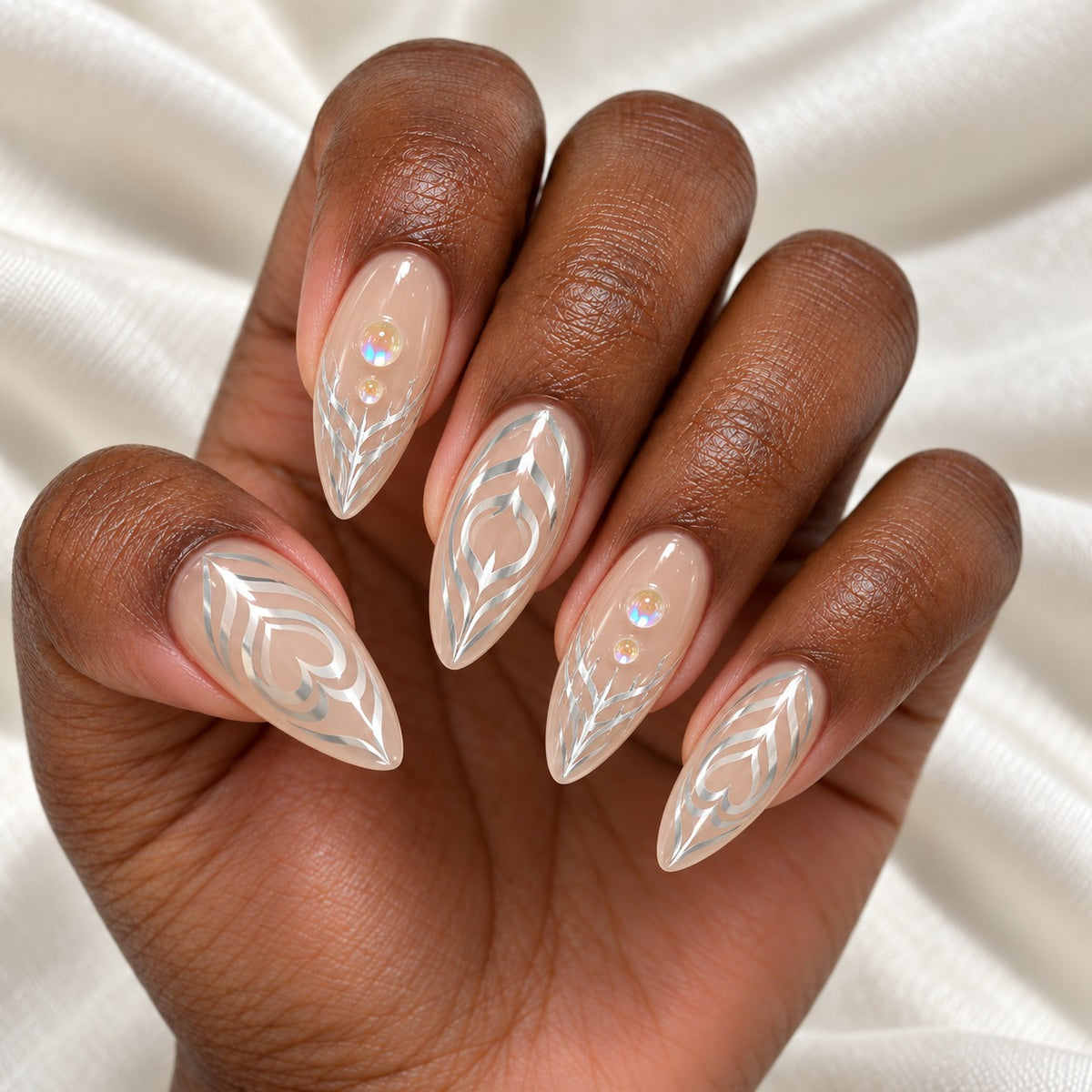 Hand wearing Clear Nude Almond with White Swirl & Pearls press-on nails