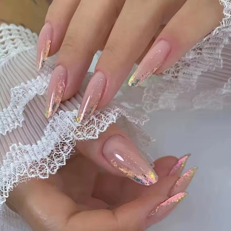 Hand wearing Nude Holographic Foil Almond press-on nails