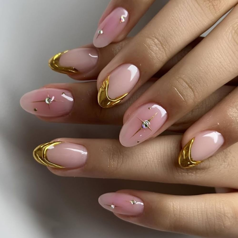 Hand wearing Pink & Gold Chrome Star Almond press-on nails