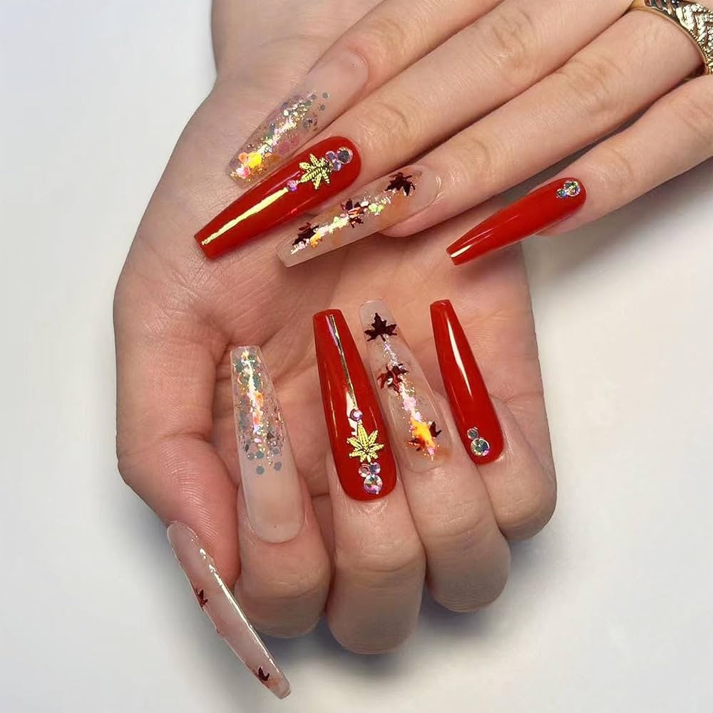 Hand wearing Red & Gold Autumn Leaf Coffin press-on nails